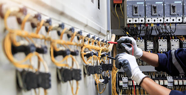 Professional Electrician technician working in Village of Four Seasons, MO